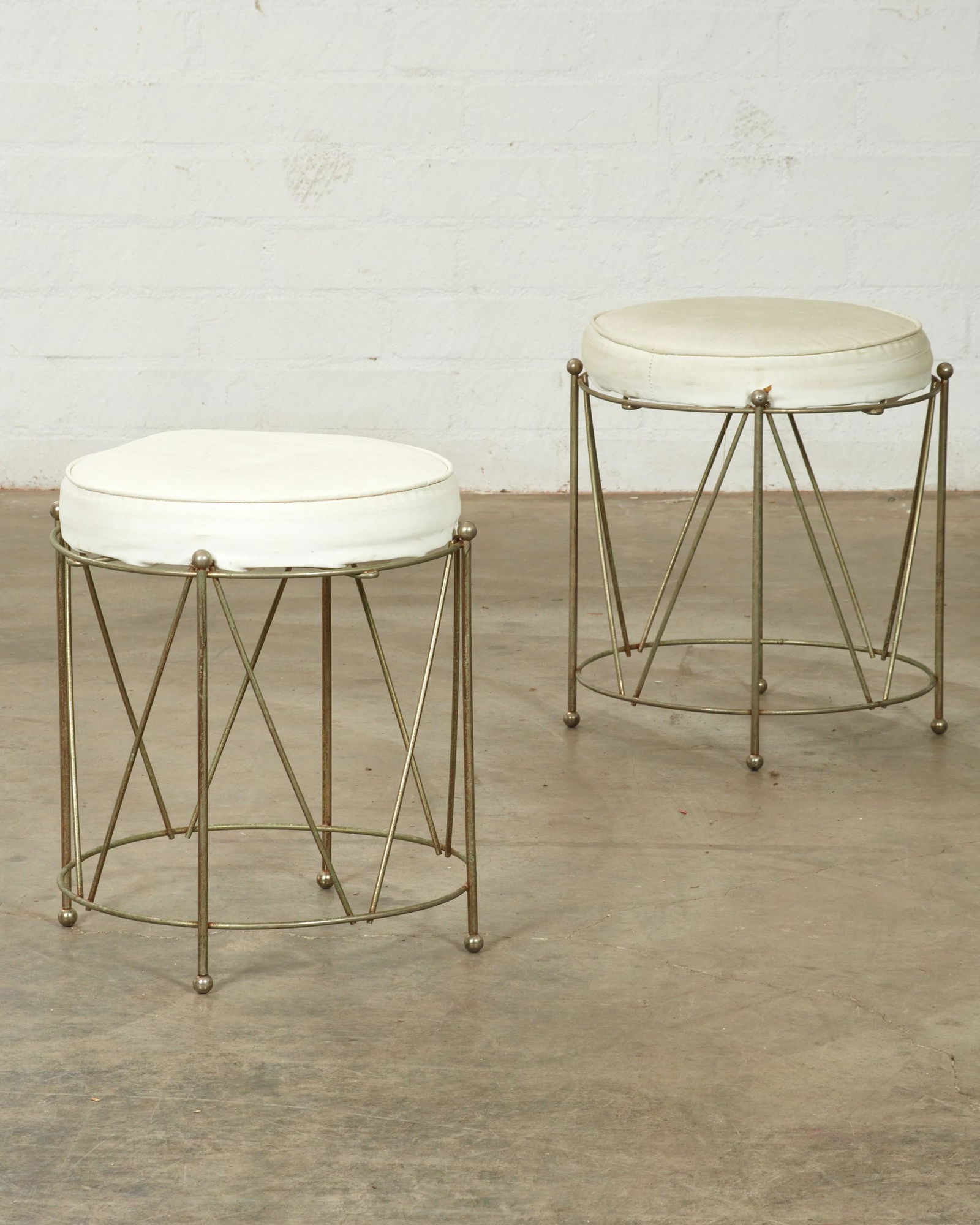A pair of Laidlaw silvered iron wirework stools (1 of 2)