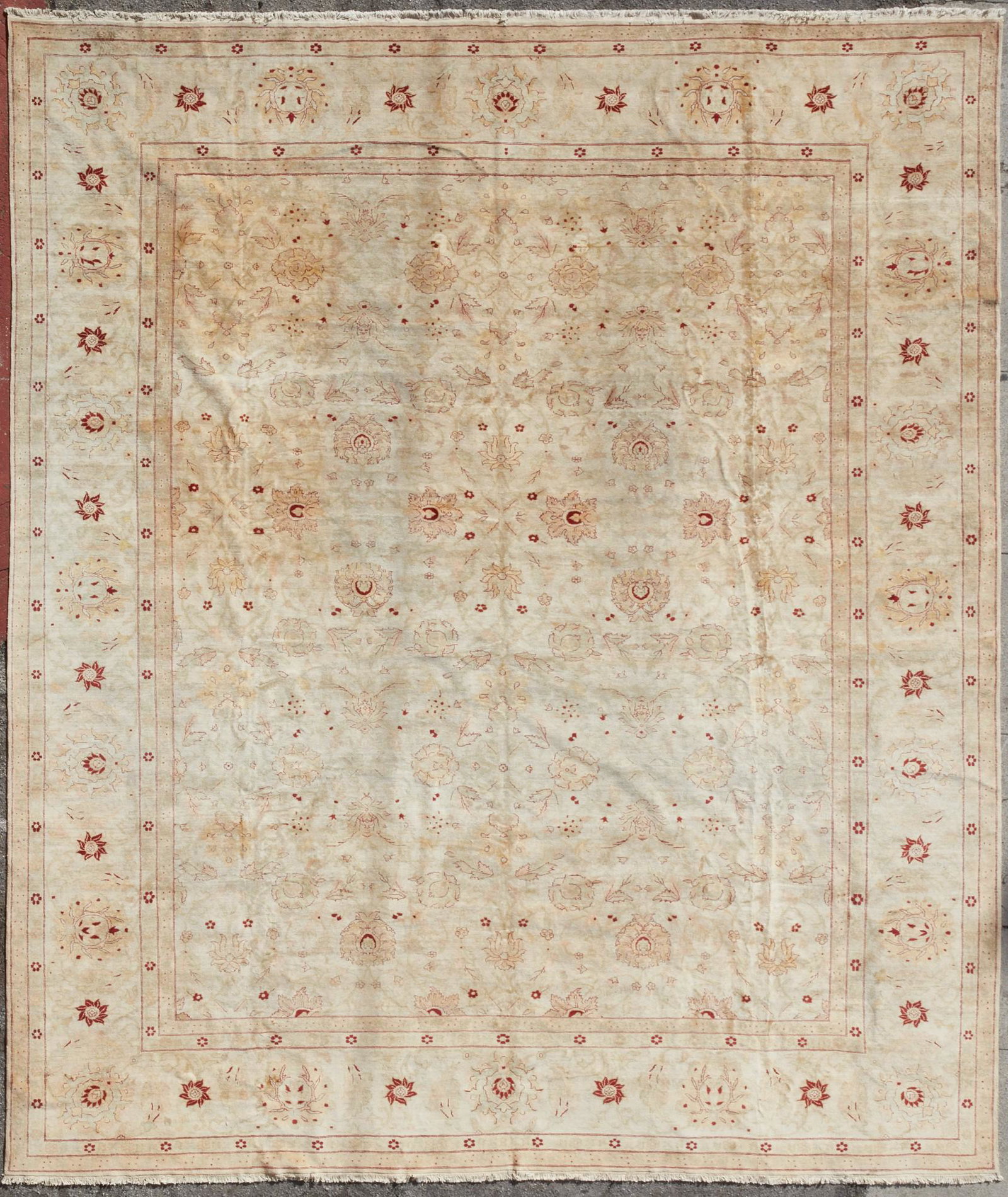 A room size rug: A room size rug approximately 19ft x 16ft 3in (582 x 500cm) Provenance: Property from a Craig Wright designed residence of a former Getty Trustee, Los Angeles, California.