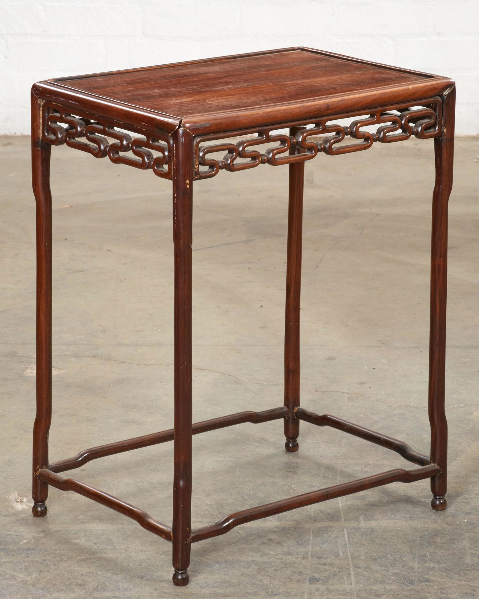 A Chinese hardwood side table (1 of 5)