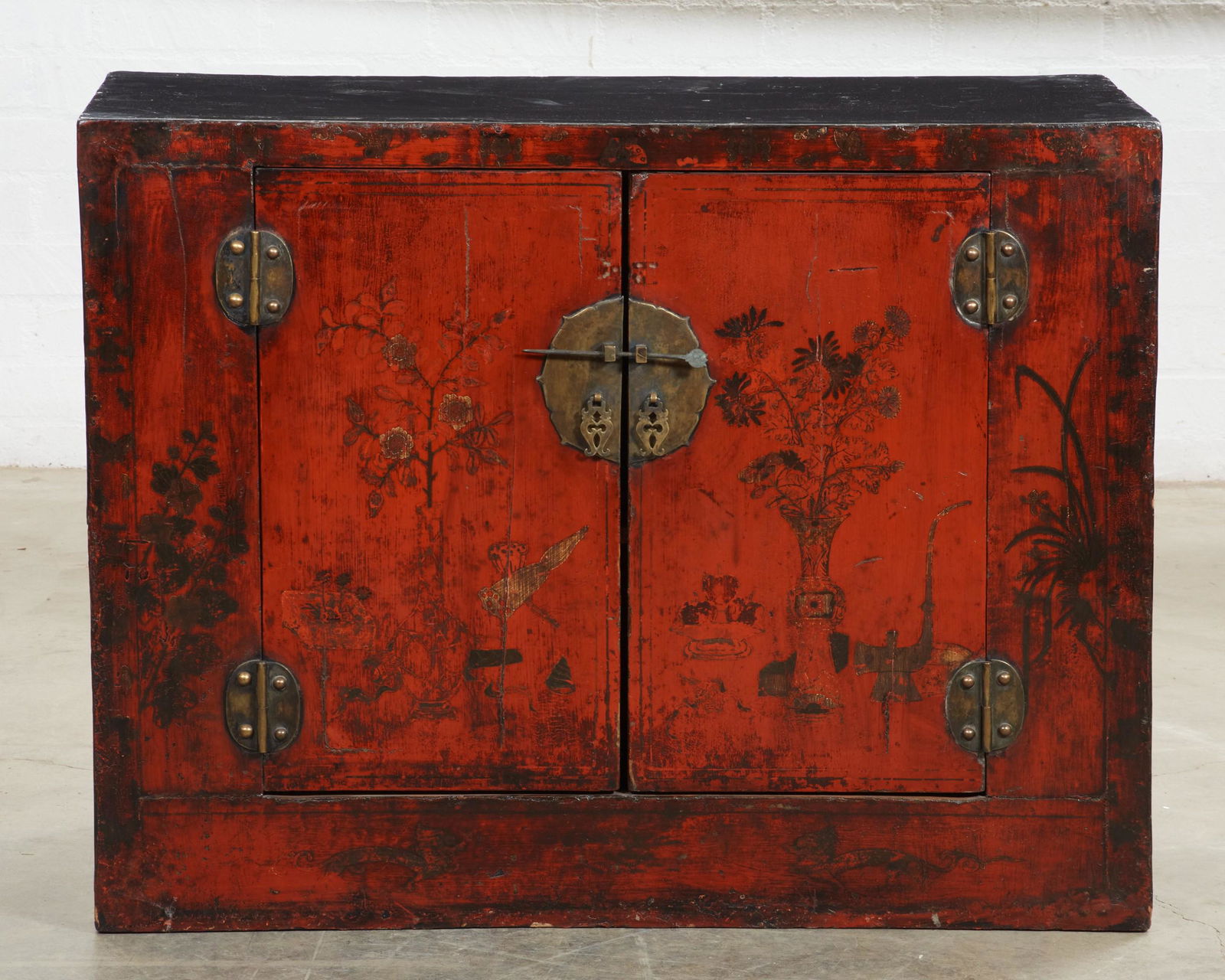 A Chinese red and black lacquer cabinet (1 of 5)