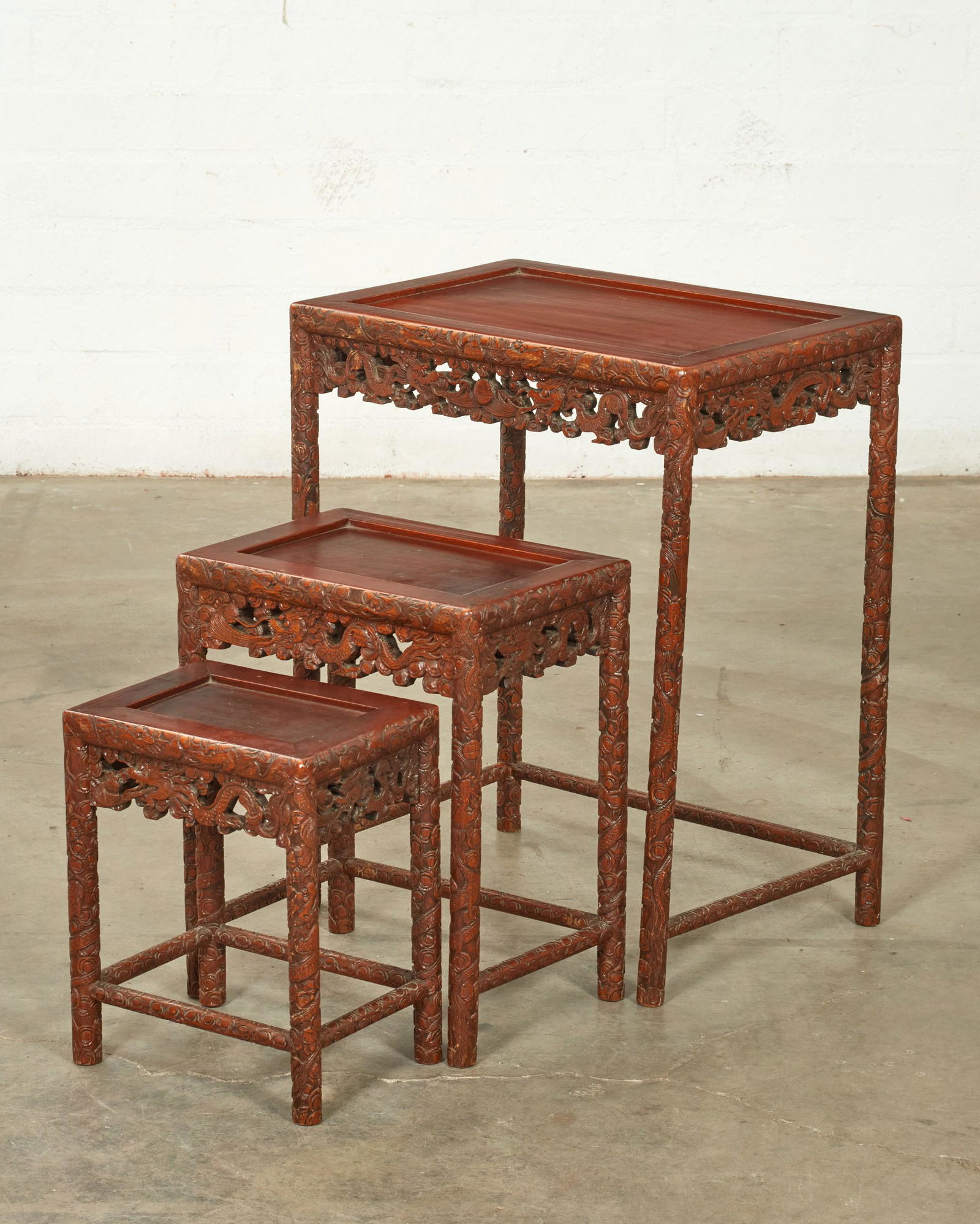 A set of three Chinese hardwood tables (1 of 5)