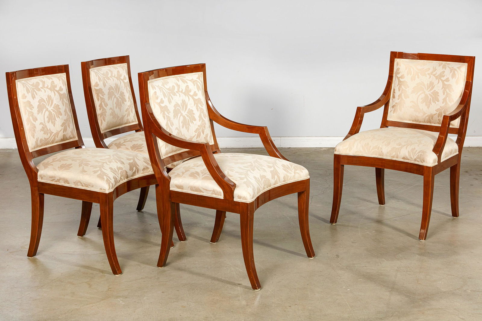 Four J. Robert Scott mahogany dining chairs: A set of four J. Robert Scott mahogany dining chairspost 1950Comprising two armchairs and two side chairs.the armchairs height 38in (96.5cm); width 24in (61cm); depth of seat 20in (51cm)