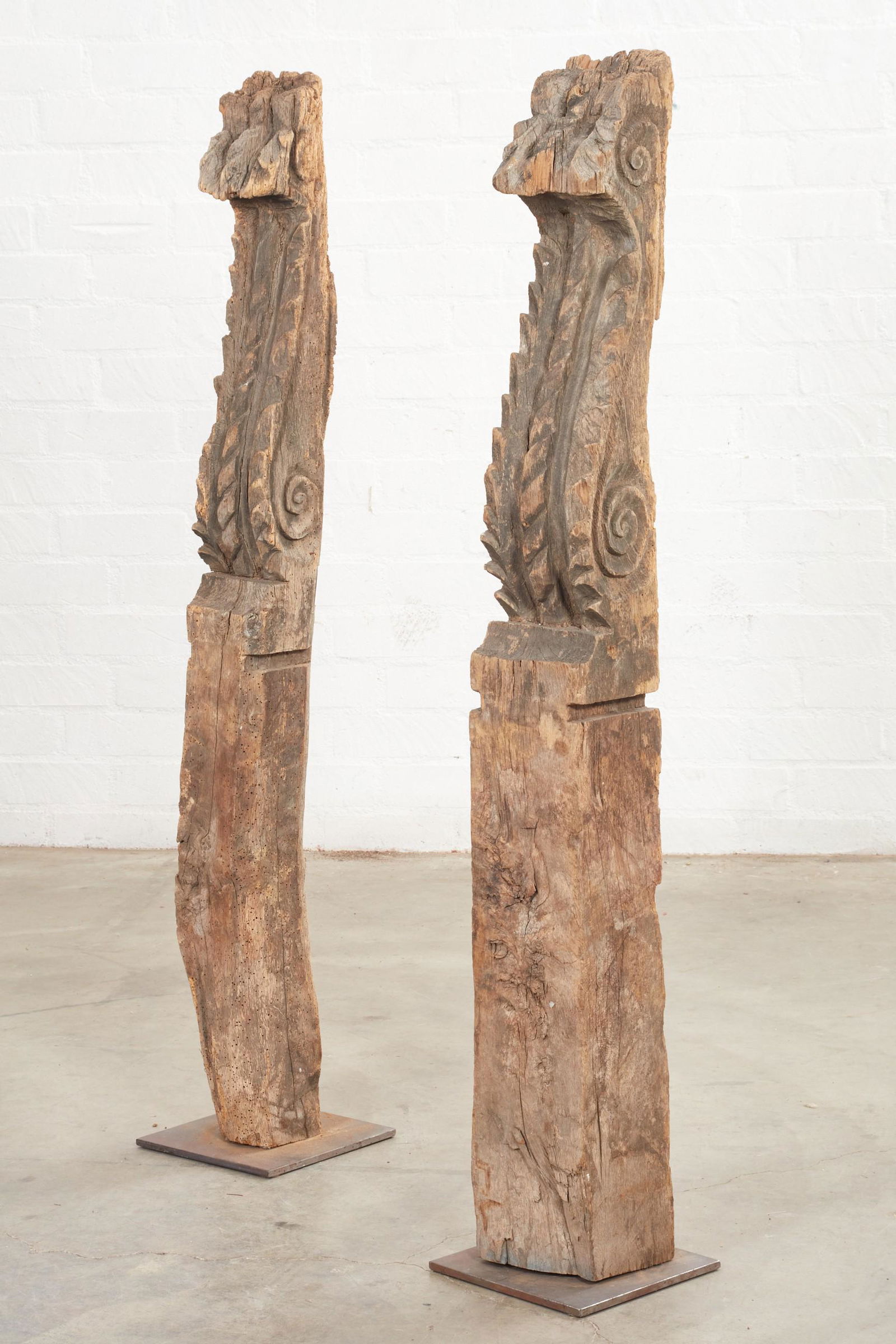 A pair of  Baroque style carved oak scroll terms (1 of 3)