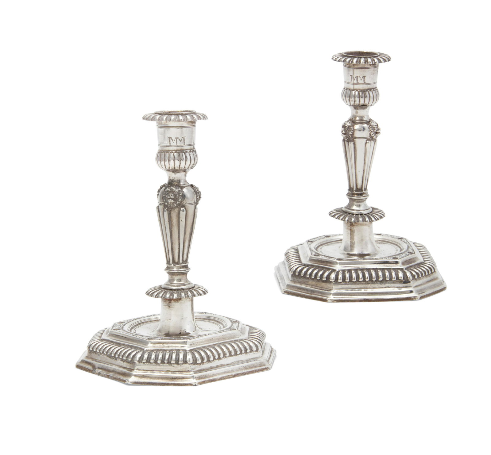 A pair of German silver candlesticks (1 of 3)