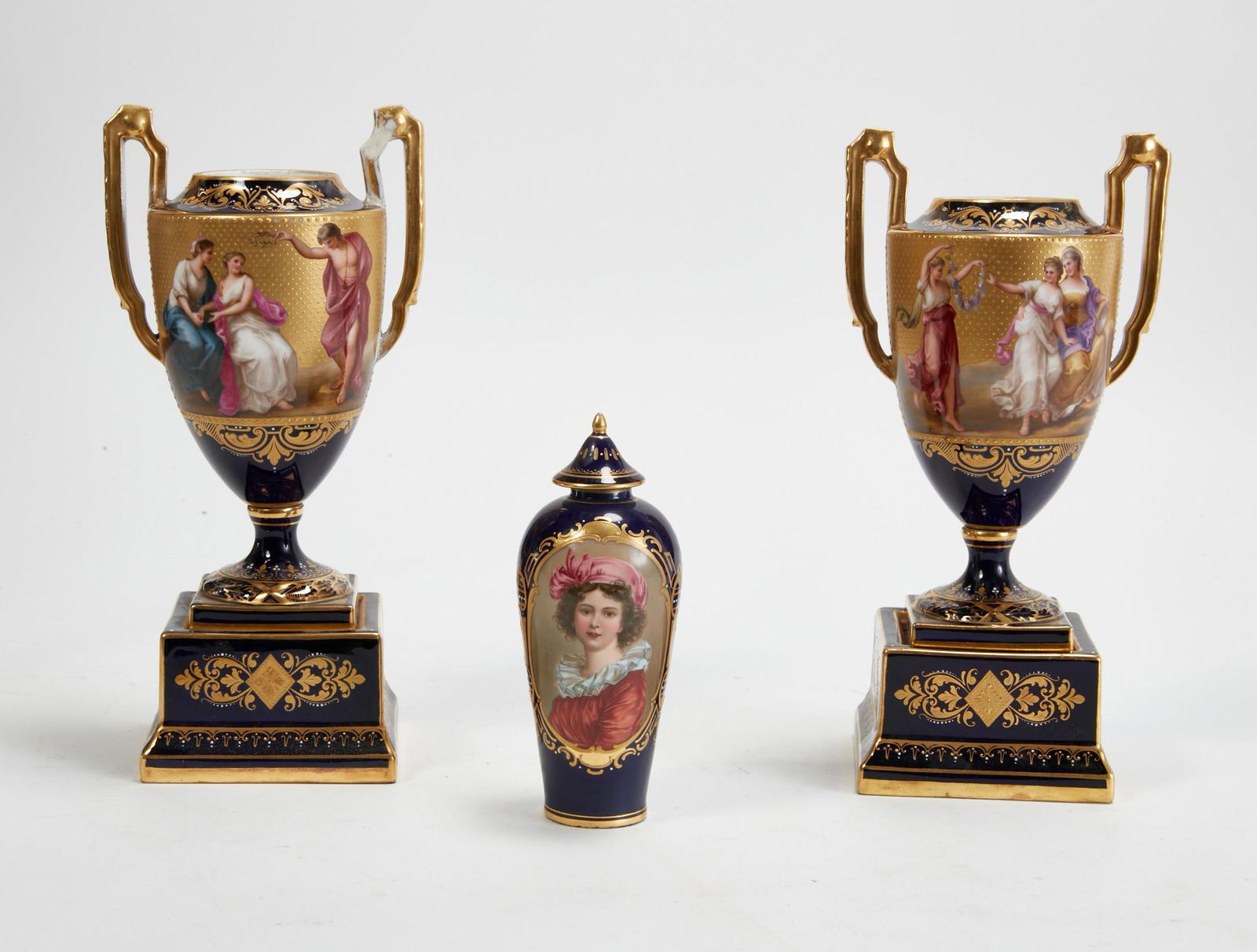 A group of three Vienna style porcelain urns (1 of 5)