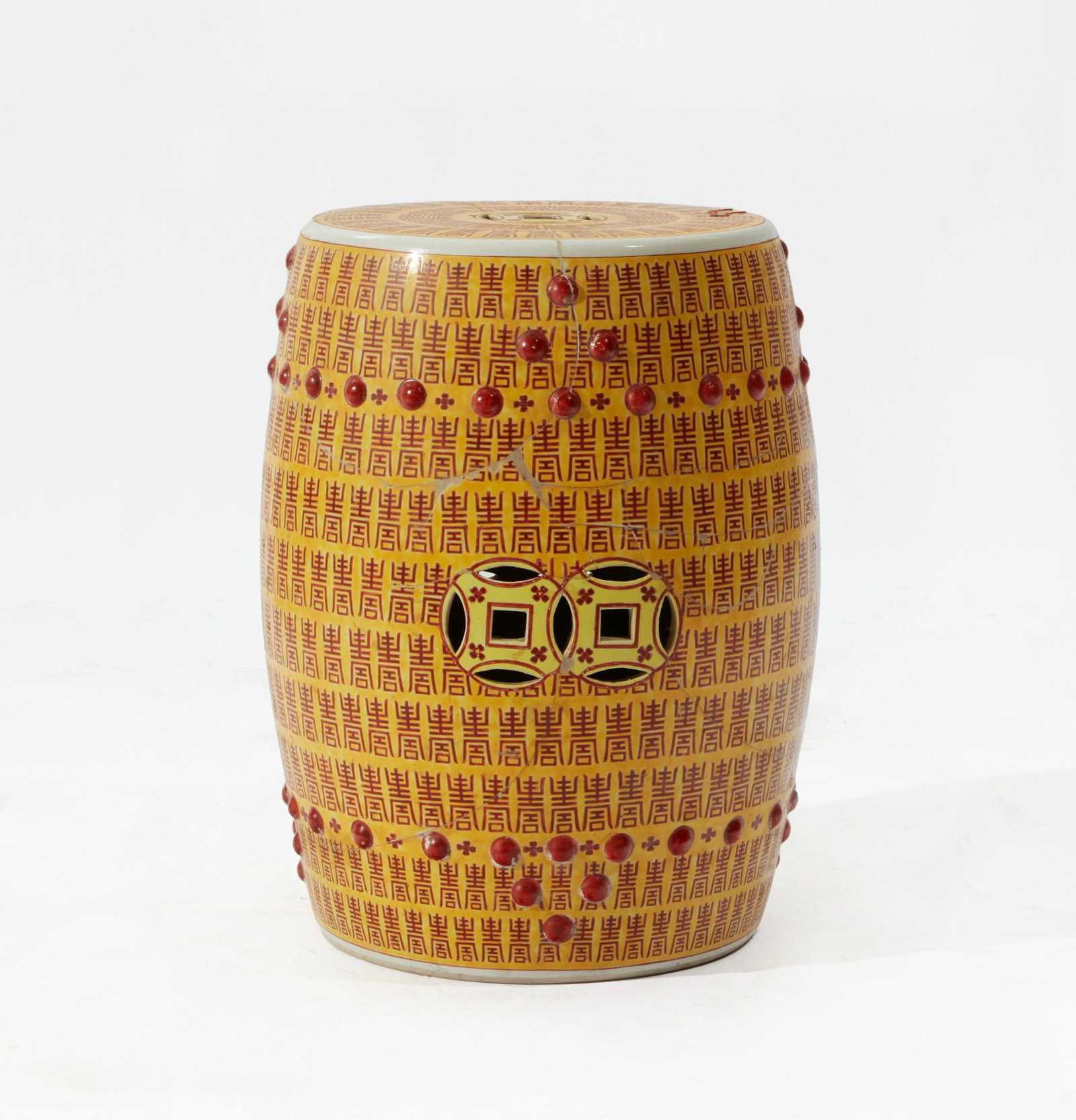 A Chinese yellow and red porcelain garden seat: A Chinese yellow and red porcelain garden seat height 18 3/4in (48cm); diameter 13 1/2in (34cm)