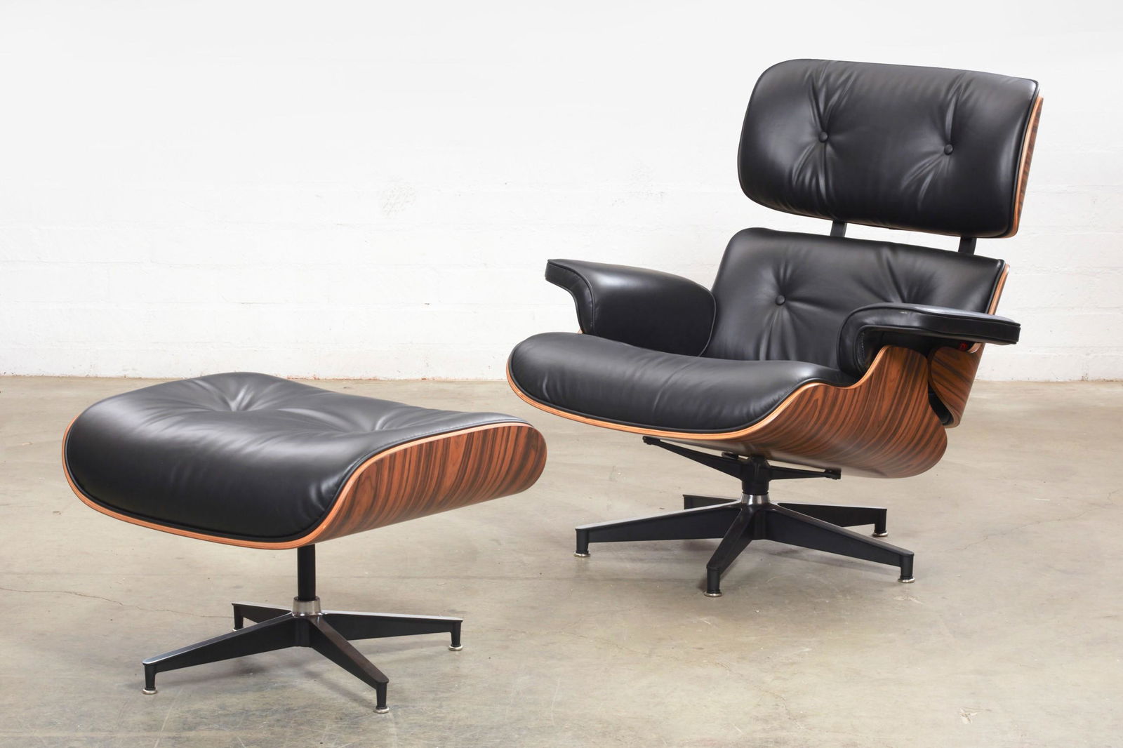 An Eames style lounge chair and ottoman (1 of 5)