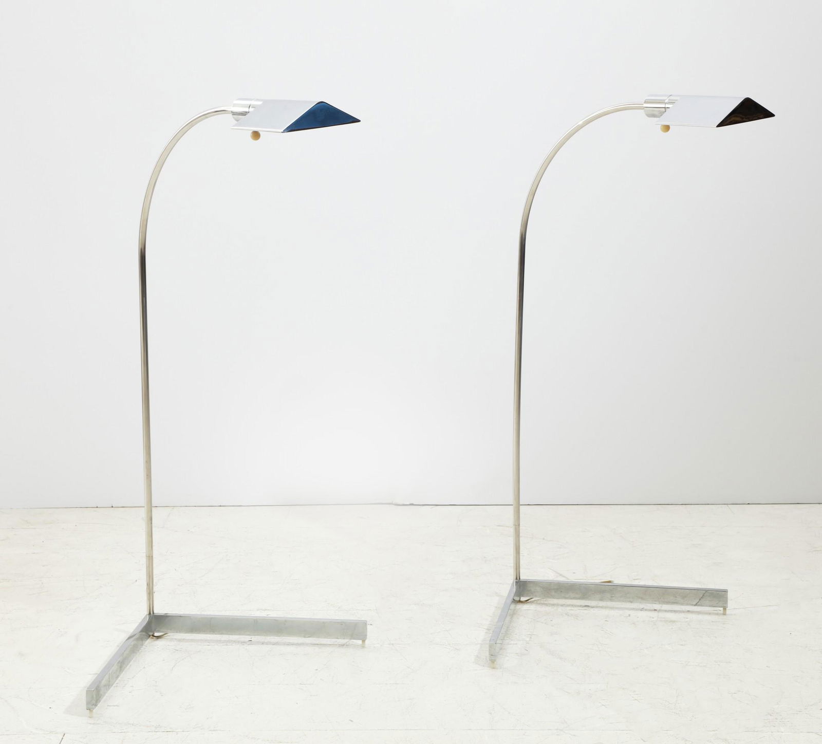 A pair of Modernist chrome floor lamps (1 of 4)