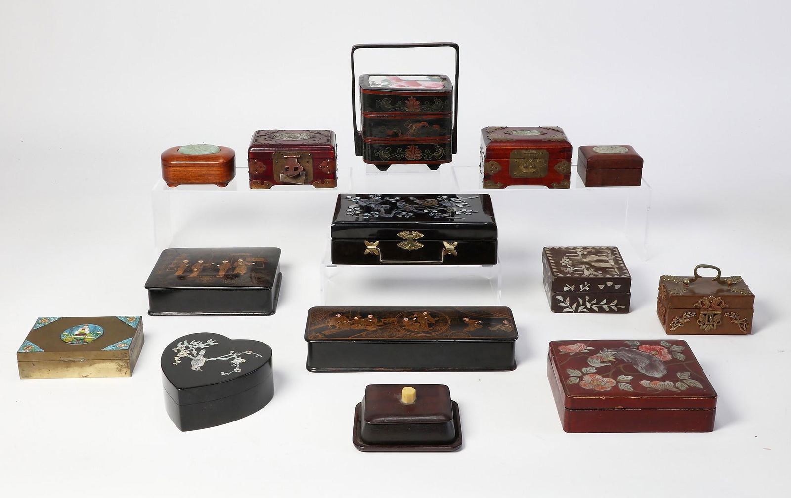 A group of fourteen Asian decorative boxes: A group of fourteen Asian decorative boxesVarious media.tallest 7 1/2in (19cm)