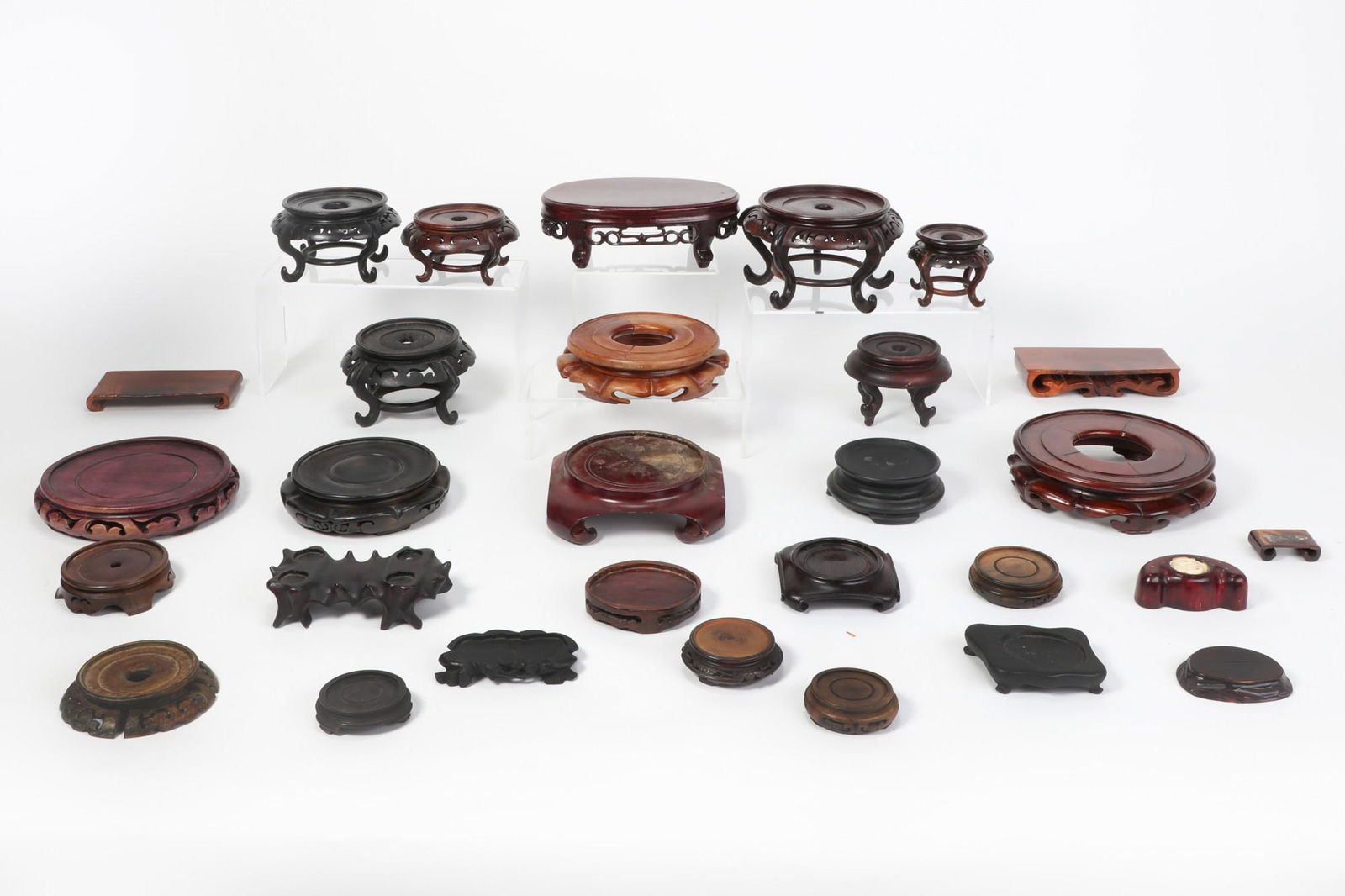 A group of Asian decorative wood stands (1 of 2)