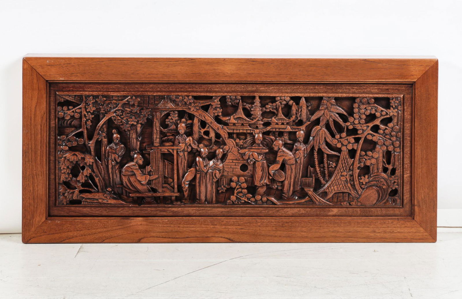An Asian carved wood panel (1 of 2)