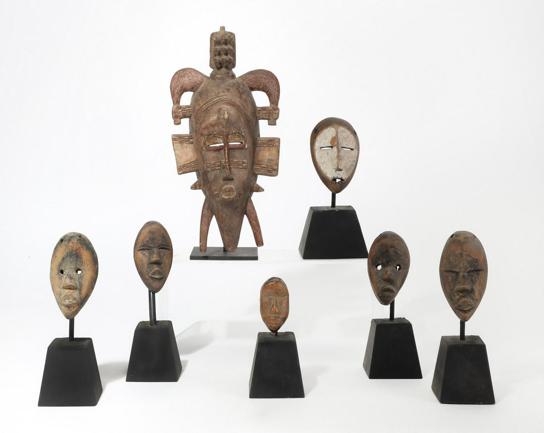 Seven African wooden tribal masks (1 of 2)