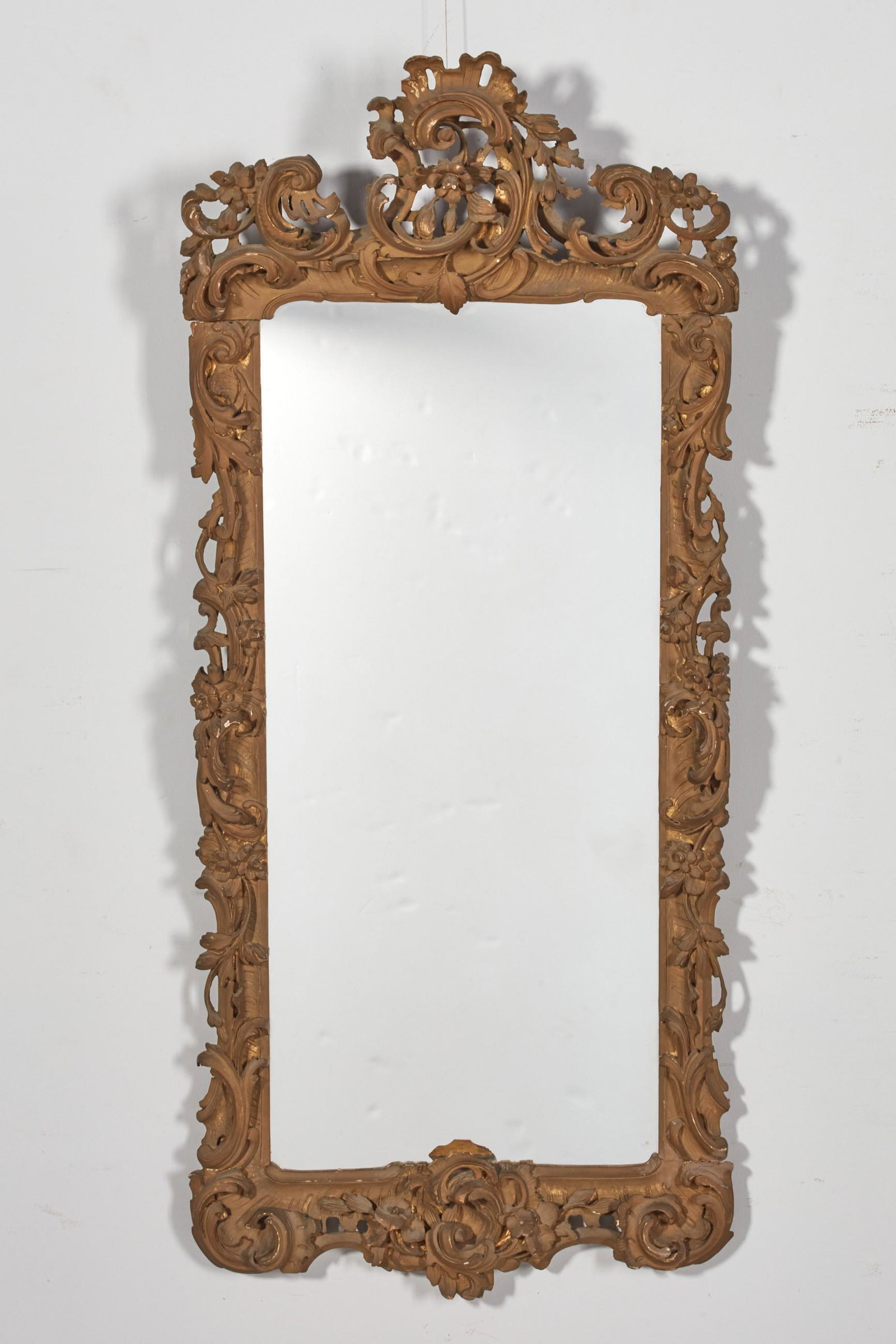 A Continental Rococo style giltwood mirror (1 of 4)