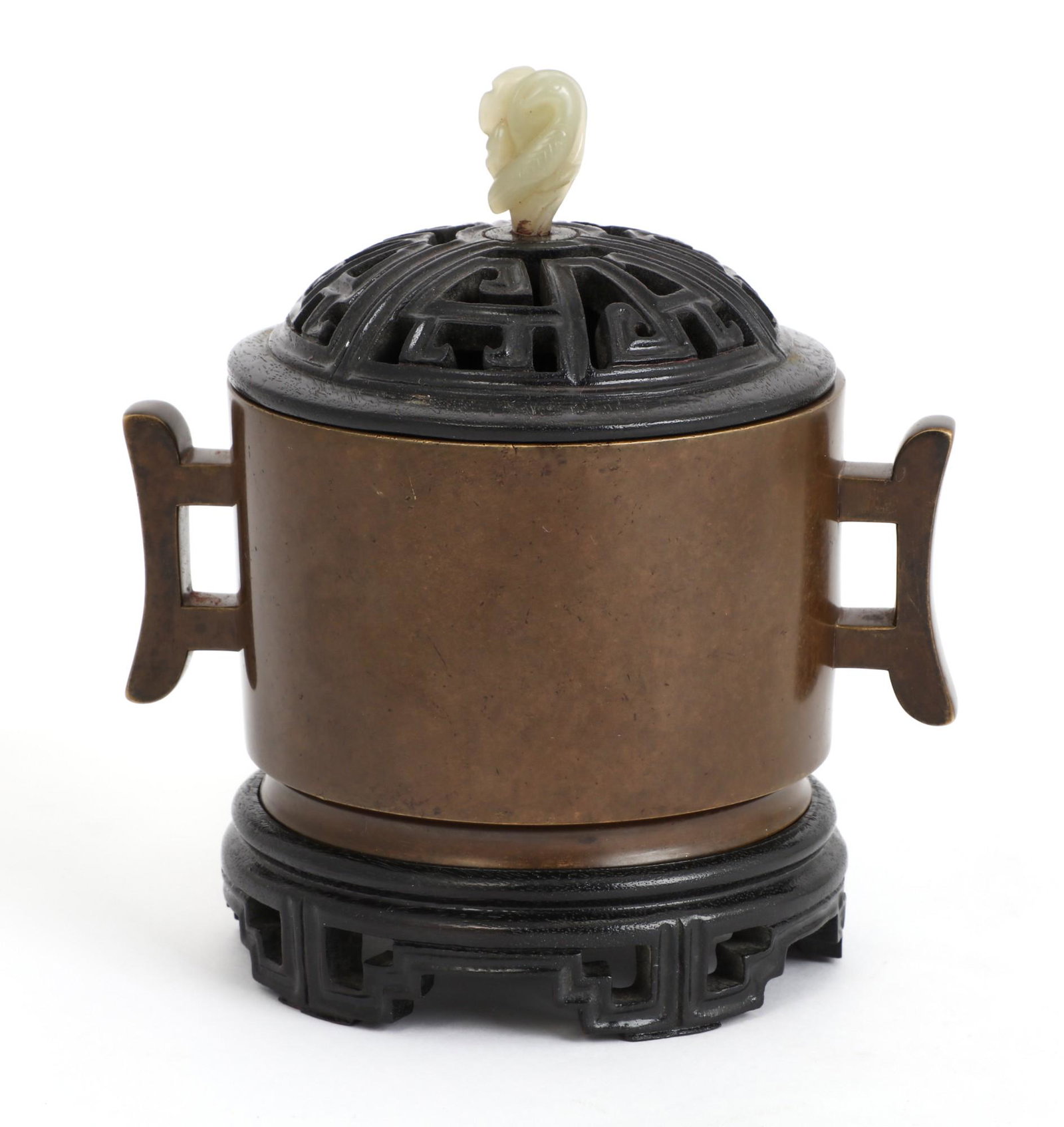 A Chinese patinated bronze circular censer (1 of 3)