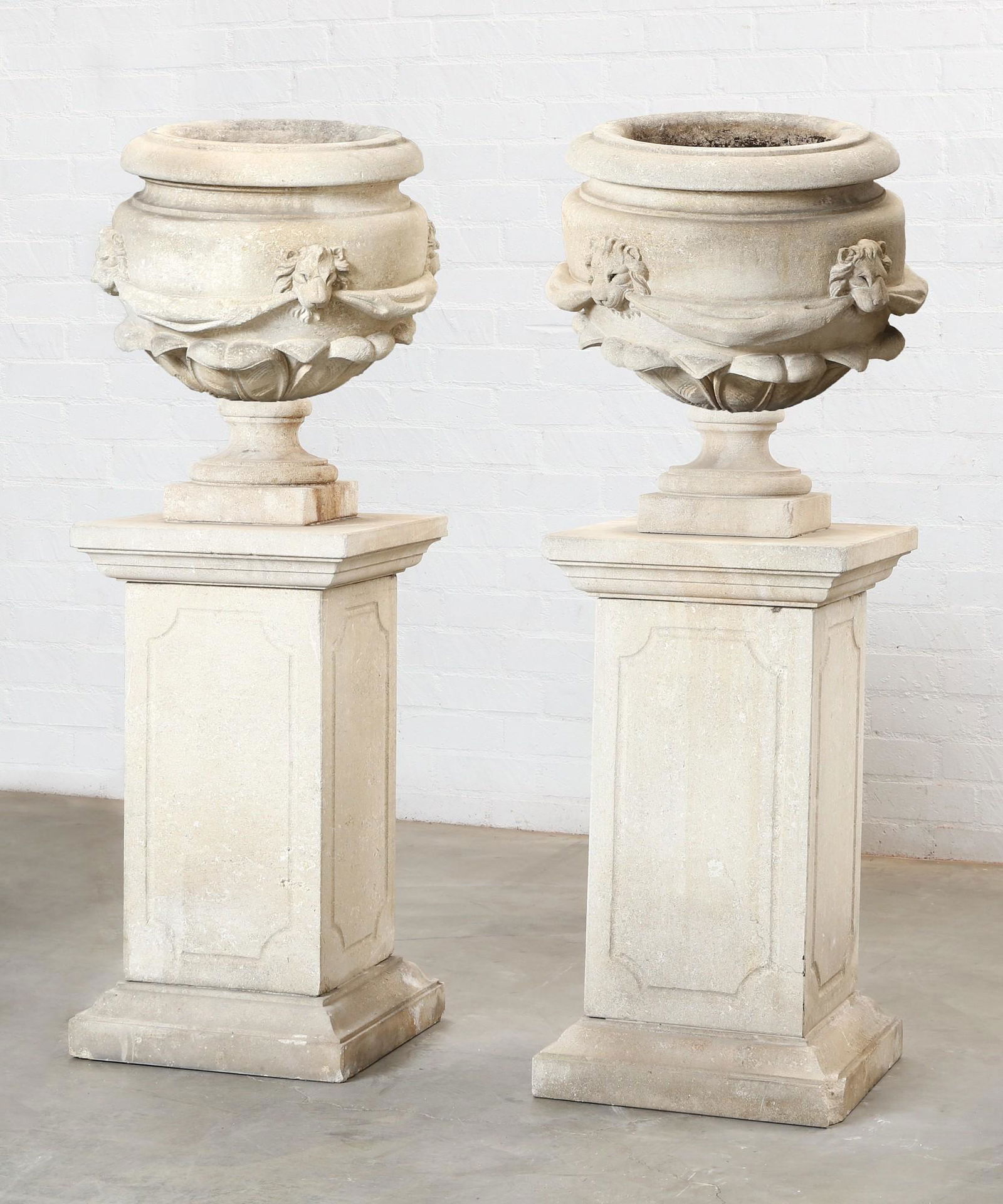 A pair of Neoclassical style limestone  urns (1 of 7)