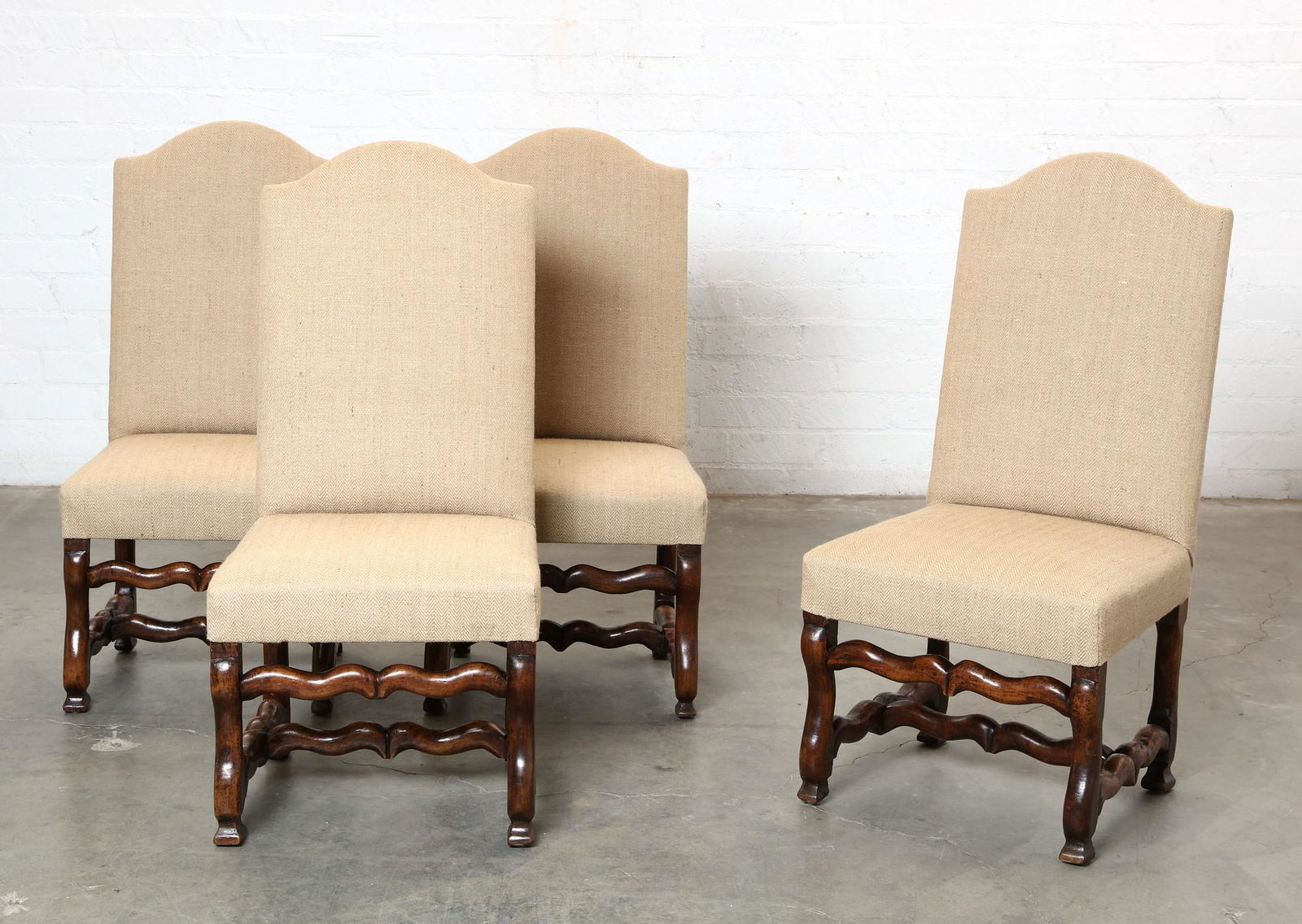 A set of four Louis XIV stained walnut chaises: A set of four Louis XIV stained walnut chaisesearly 18th centuryheight 42in (107cm); width 20 1/2in (52cm); depth of seat 16 1/2in (42cm)