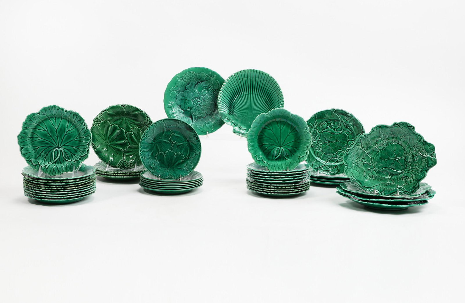 Forty four green glazed majolica dishes (1 of 3)