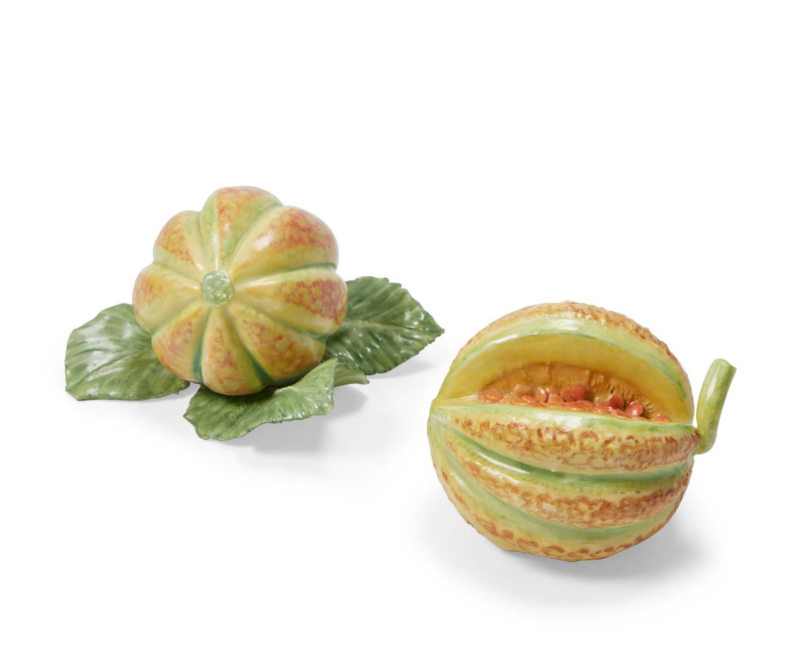 Two porcelain models of melons, Anne Gordon: Two porcelain models of melons Anne Gordon (Scottish, b.1941) dated 1985 Each with artists monogram and dated 85 to underside. heights 2 1/4 and 3in (5.5 and 7.5cm)