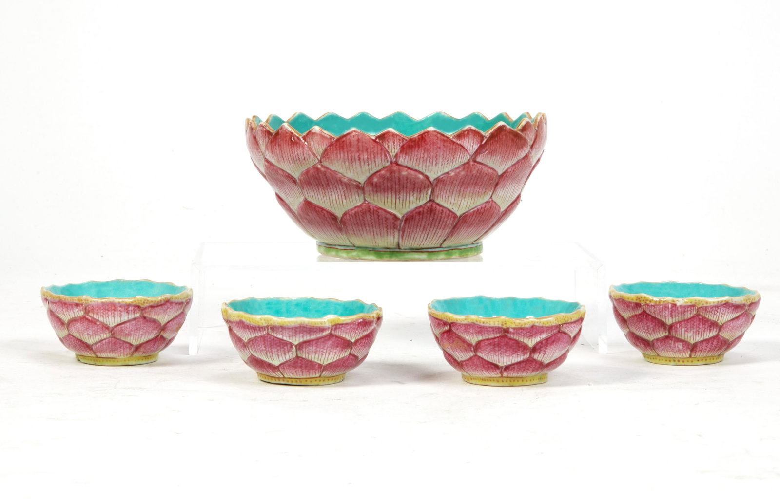 A set of five Chinese porcelain lotus form bowls: A set of five Chinese porcelain lotus form bowls largest height 3in (7.5cm); diameter 6 3/4in (17cm) Provenance: With Alberts Antiques, Hong Kong, 1990.