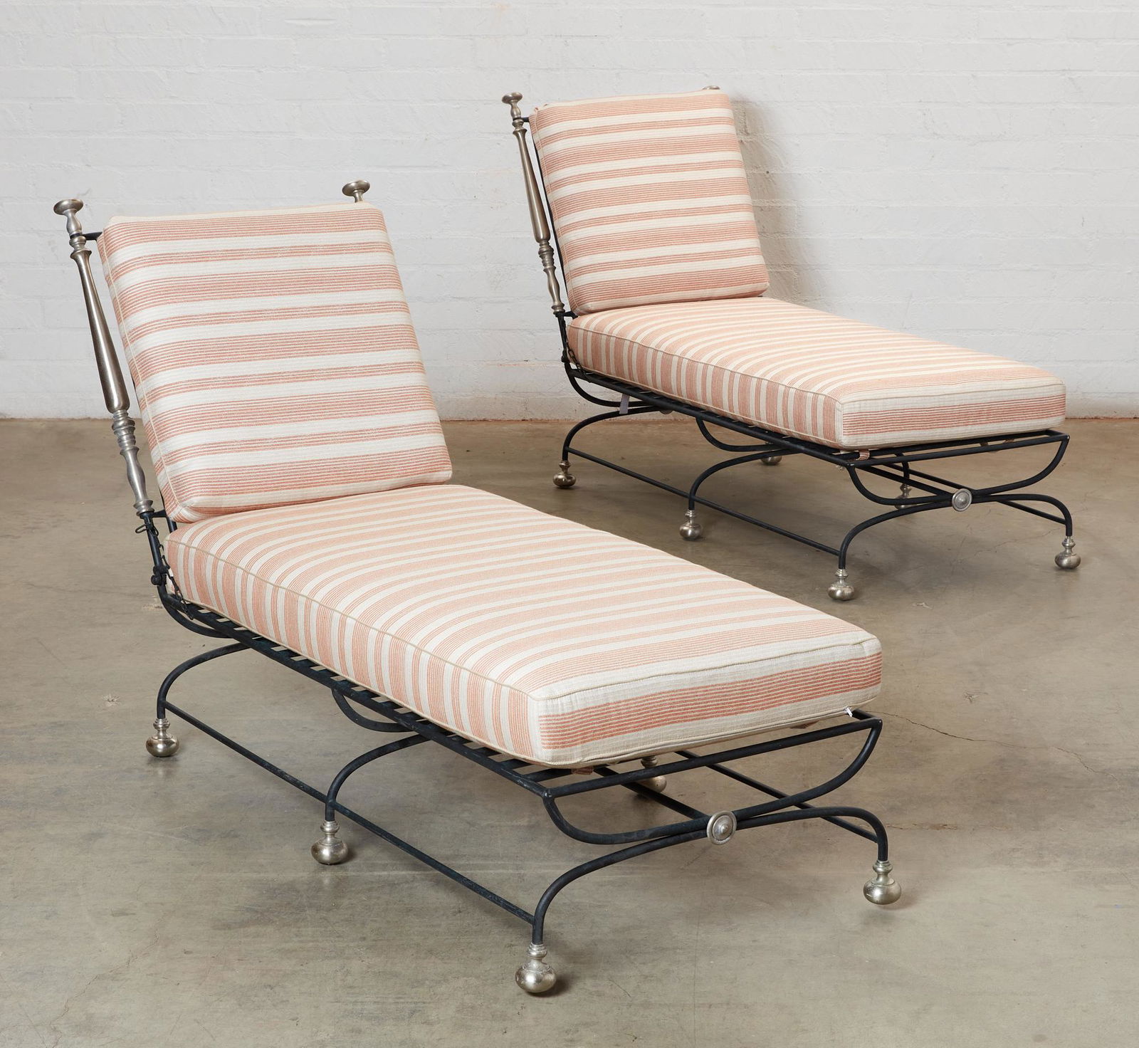 A pair of Formations Estate chaises longue: A pair of Formations ebonized metal Estate chaises longuemodernheight 41in (104cm); width 29 1/2in (75cm); depth 86in (218.5cm)