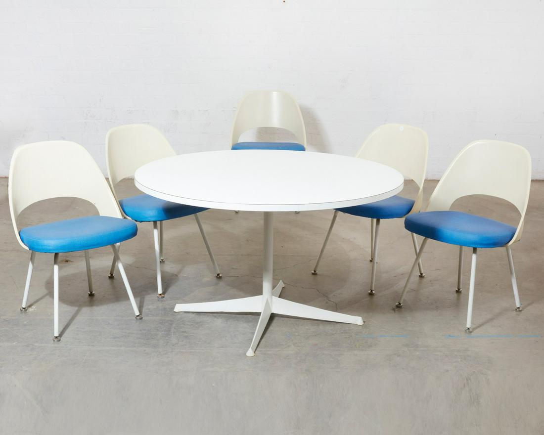 A Knoll circular dining table and five chairs (1 of 2)