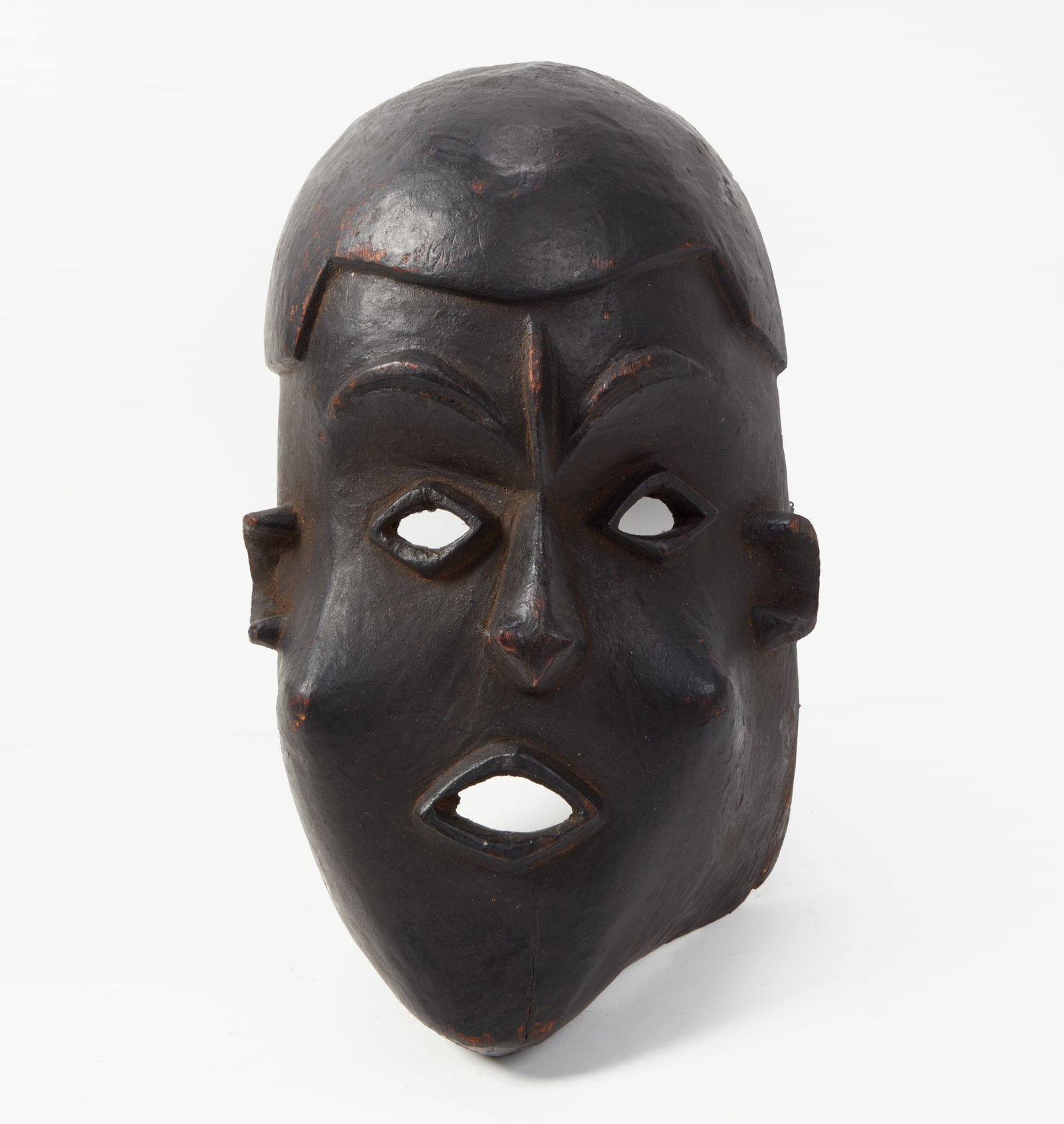 An African Tribal ebonized carved wood mask, Ekoi (1 of 5)