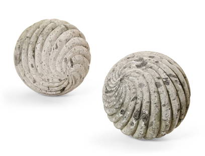 A pair of Continental limestone garden spheres: A pair of Continental spirally reeded limestone ornamental garden spheres19th centurydiameter 19in (48cm)