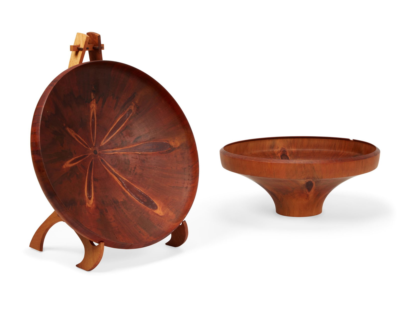 Ron Kent and Tom Calhoun turned bowls: Ron Kent (American, 1931-2018)Bowl, 1996turned Norfolk pinesigned Ron Kent and dated, on stand; together with another example by Tom Calhoun inscribed WWW TMC 6/96 (3)the larger 4 3/4 x 16