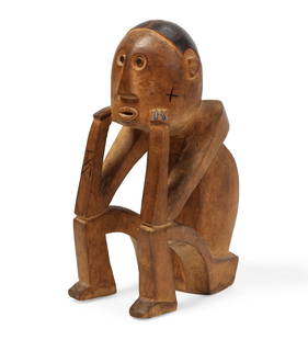 An African Tribal wood seated figure, Zaire: An African Tribal wood seated figureZaireNumbered 0-540.height 11 1/4in (28.5cm); width 4 1/4in (11cm); depth 7in (17.5cm) Provenance:With Volta Place Gallery, Washington, D.C., 1984.