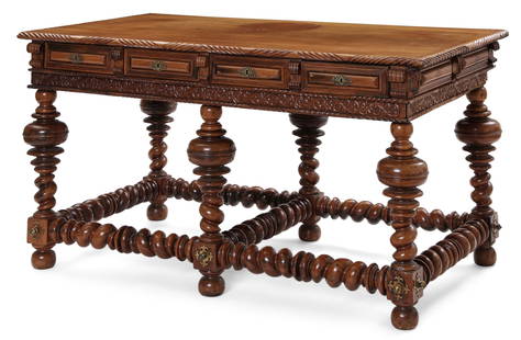 A Portuguese Baroque walnut library table: A Portuguese Baroque brass mounted walnut library table18th centuryheight 36in (91.5cm); width 68 3/4in (175cm); depth 36in (94cm)