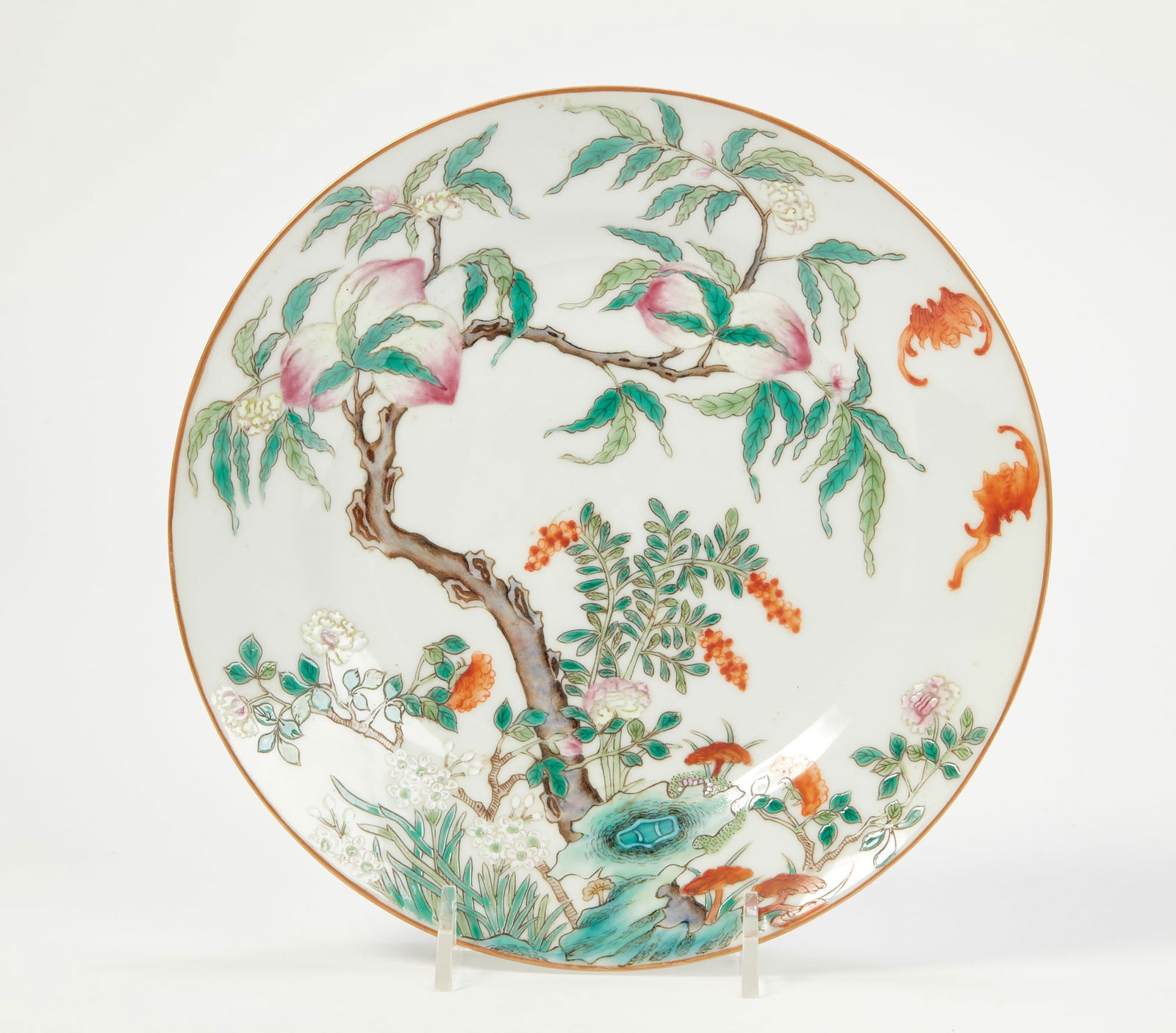 A Chinese famille rose porcelain peach tree dish (1 of 2)