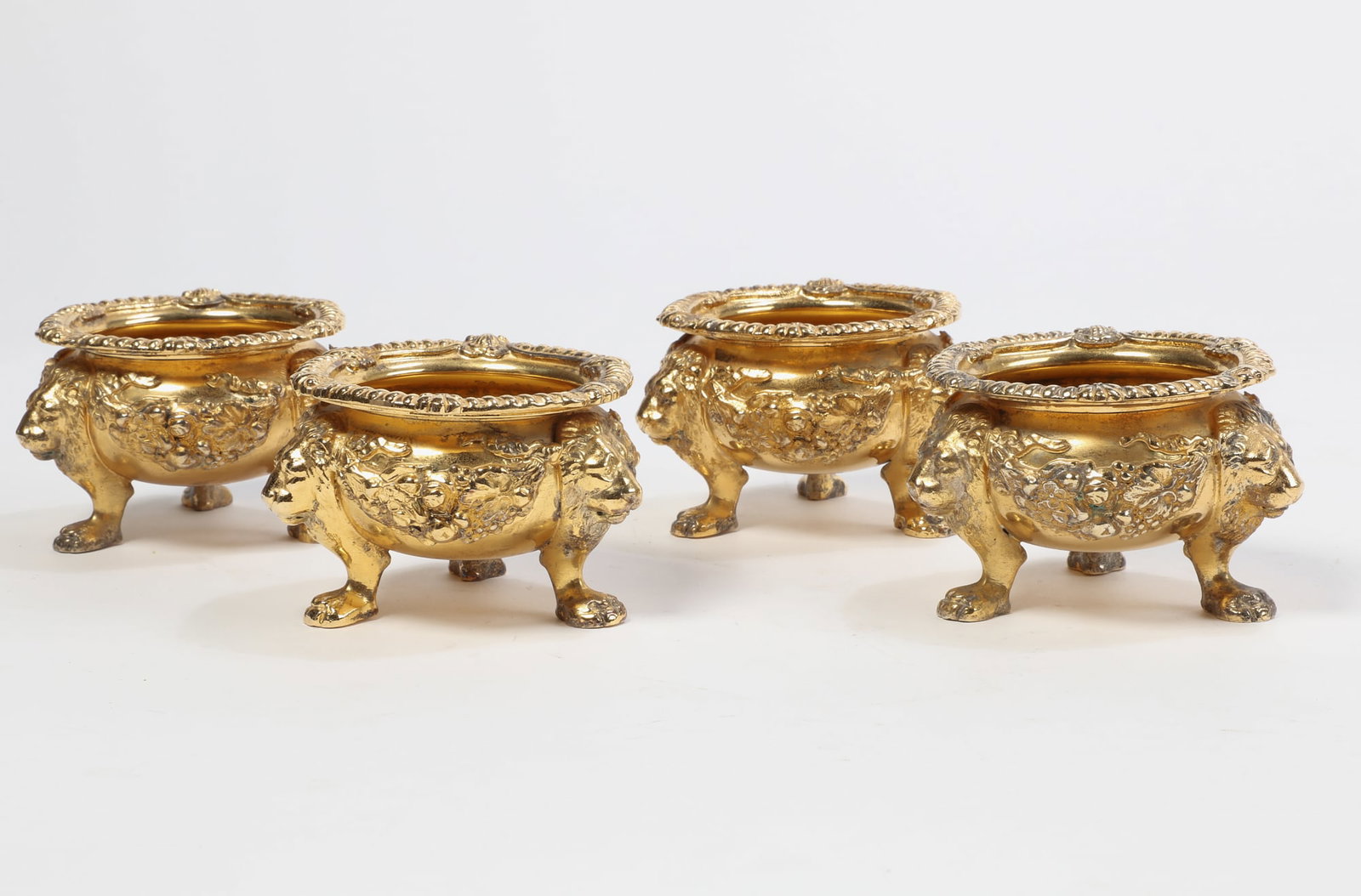 Four Regency style silver gilt master salts (1 of 3)