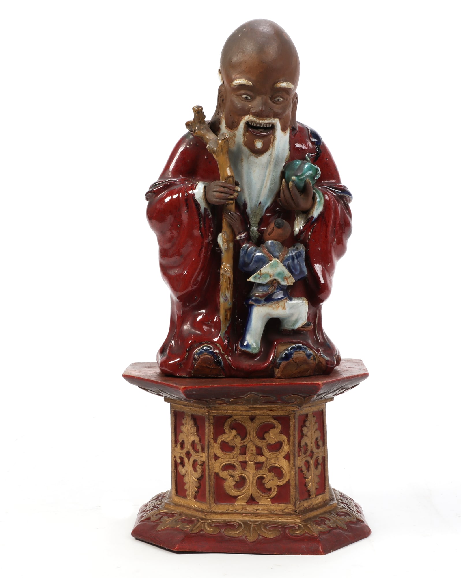 A Chinese Shiwan clay and enameled figure (1 of 3)
