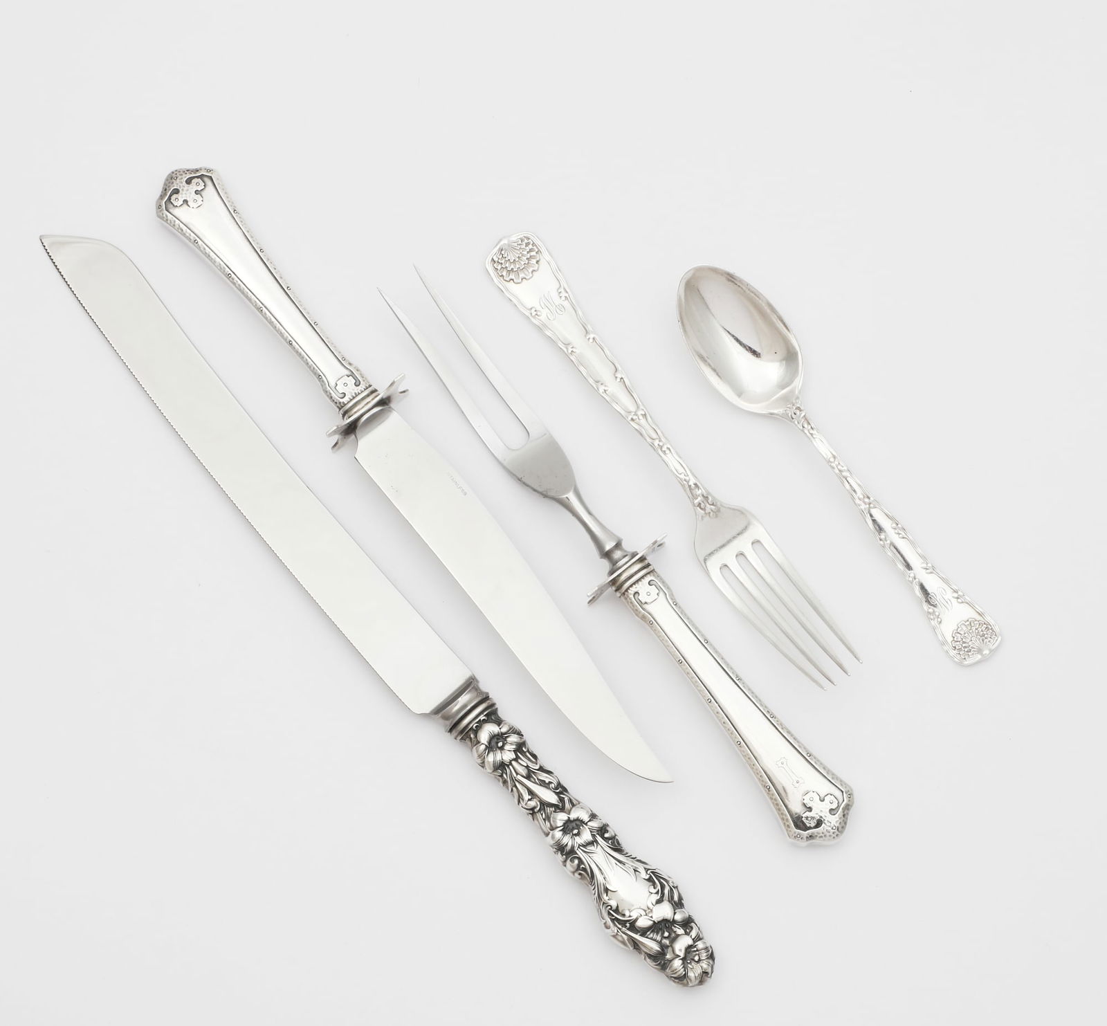 Thirteen piece group of American silver flatware (1 of 4)