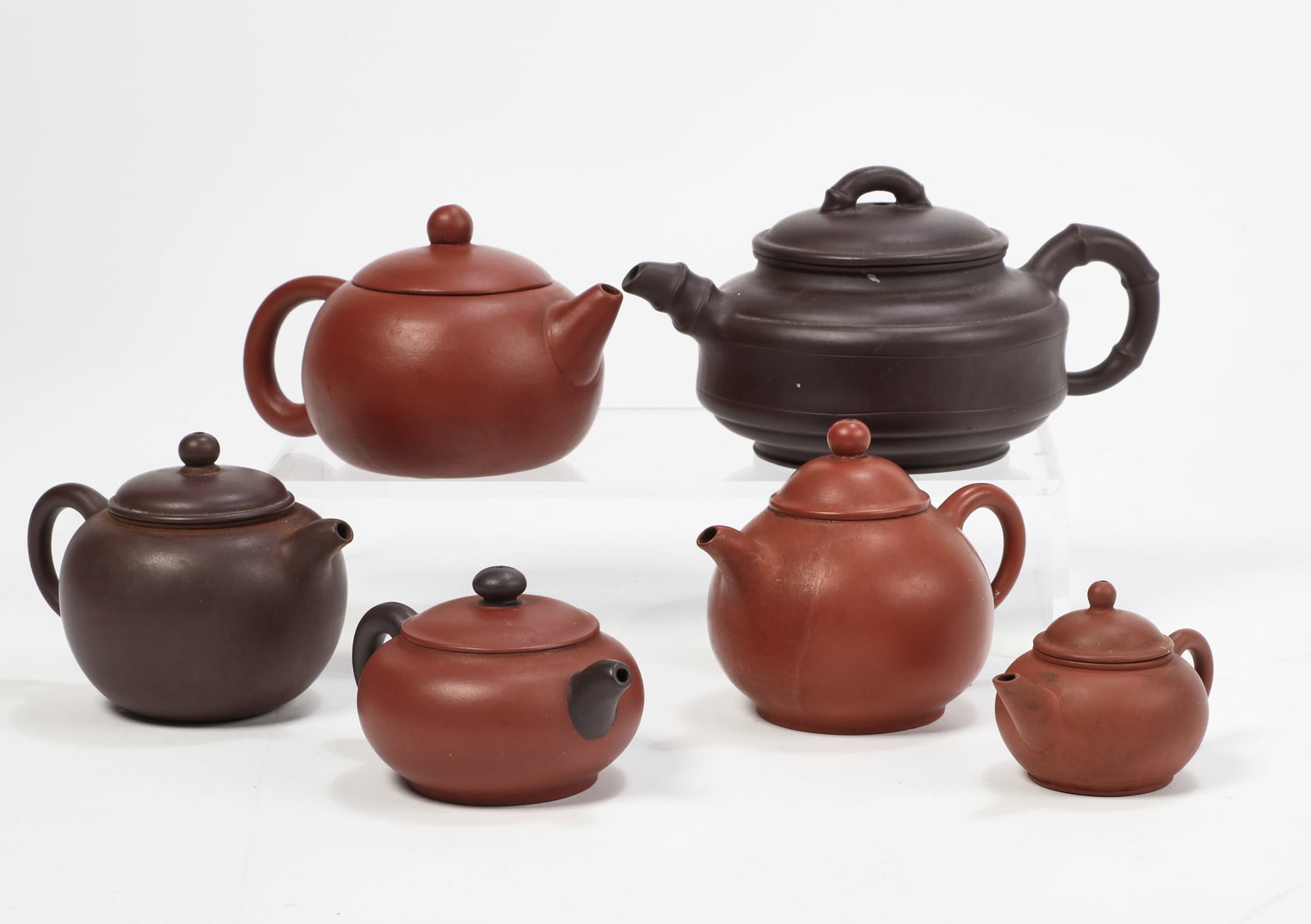 A group of six Chinese Yixing pottery teapots (1 of 12)