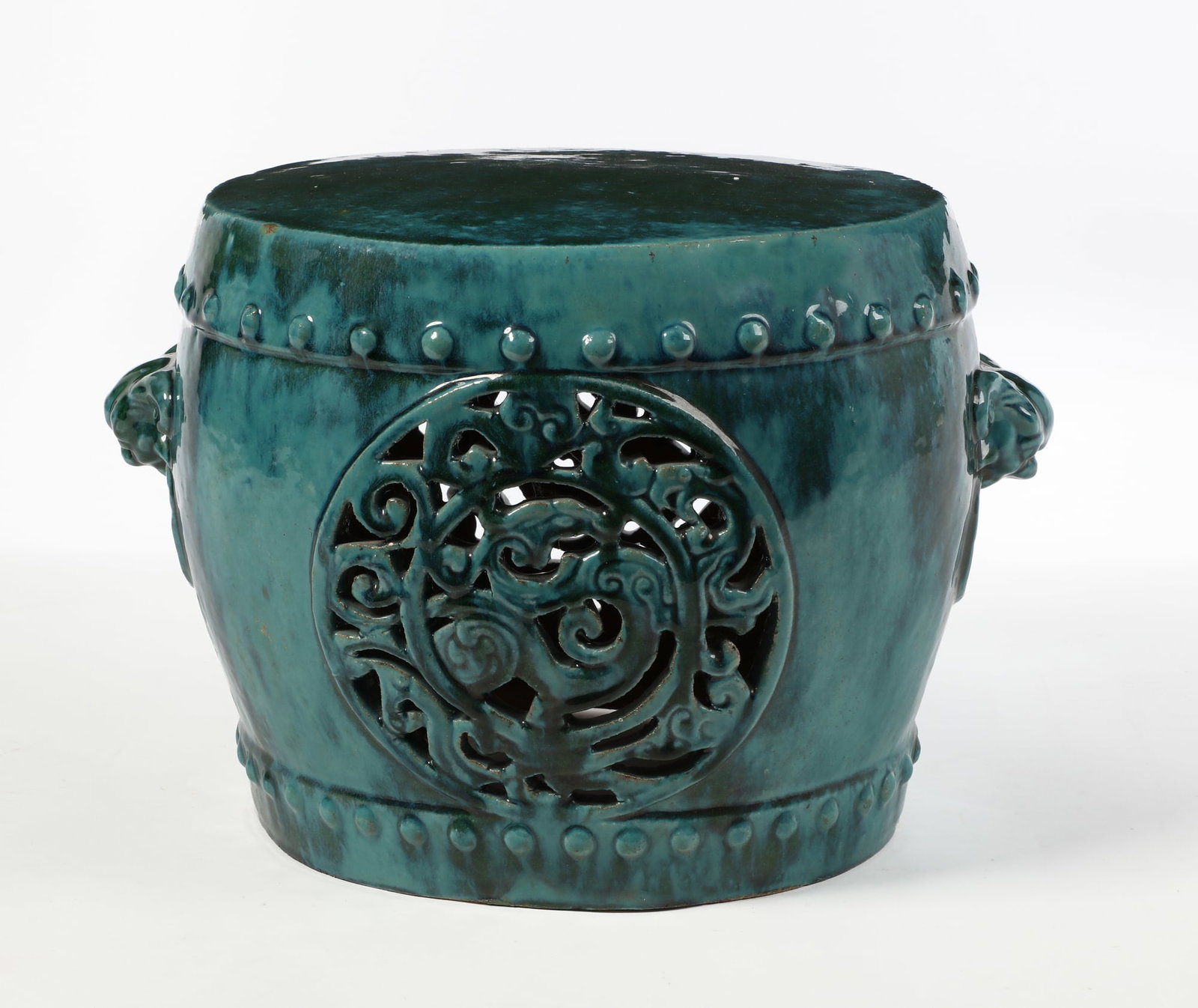 A Chinese turquoise glazed garden stool (1 of 2)