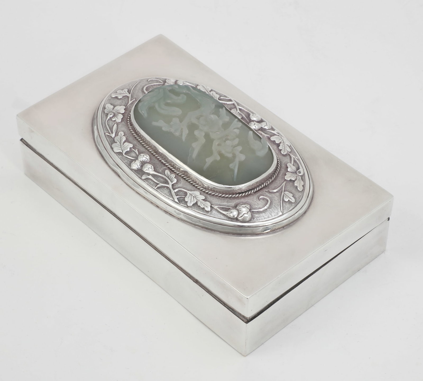 A Chinese  jade plaque in a silver box (1 of 4)