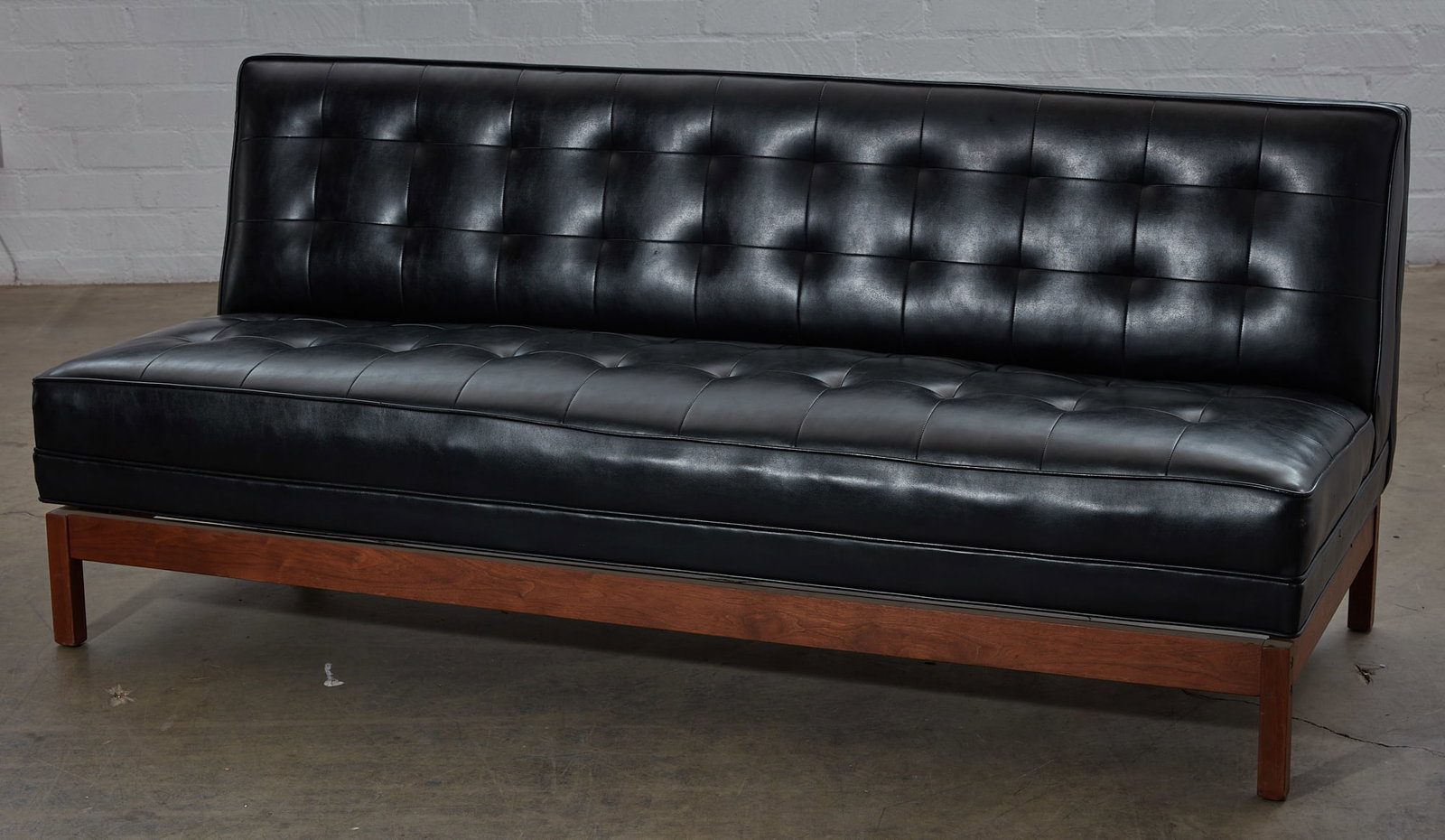 A hardwood framed faux black leather settee (1 of 4)