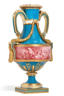 An English turquoise ground porcelain vase: An English turquoise ground porcelain vaseprobably Mintonlate 19th centuryCentered by a pink band of putti at play.height 18 1/2in (47cm); width 10 1/4in (26cm); depth 8in (20cm) Provenance:Pro