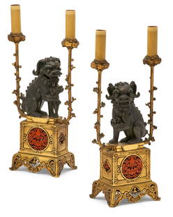 A pair of French Chinoiserie two light candelabra: A pair of French gilt and patinated bronze and faux cinnabar lacquer Chinoiserie two light candelabraearly 20th centuryoverall height 20in (51cm); width 9 1/2in (24cm); depth 5 1/2in (14cm) Provenance