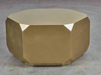 A contemporary gold painted metal low table: A contemporary gold painted metal hexagonal low tableheight 17in (43cm); diameter 35 1/2in (90cm)