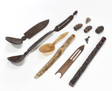 Eleven Asian mixed media articles: Eleven Asian mixed media articlesComprising a long carved stone, a horn spoon and nine additional utensils and objects.longest length 16in (40cm) Provenance:Property from the estate of a prominent Bay