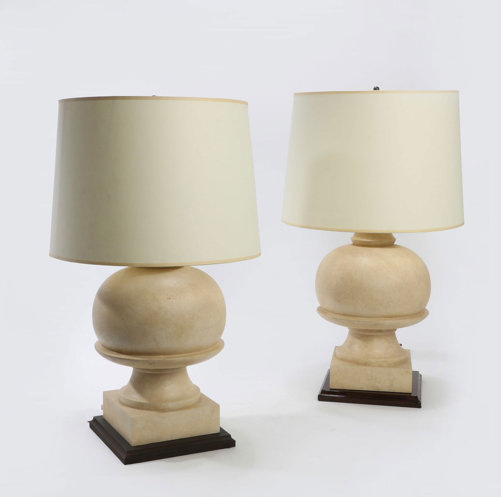 A pair of cream painted composition bulbous lamps (1 of 3)