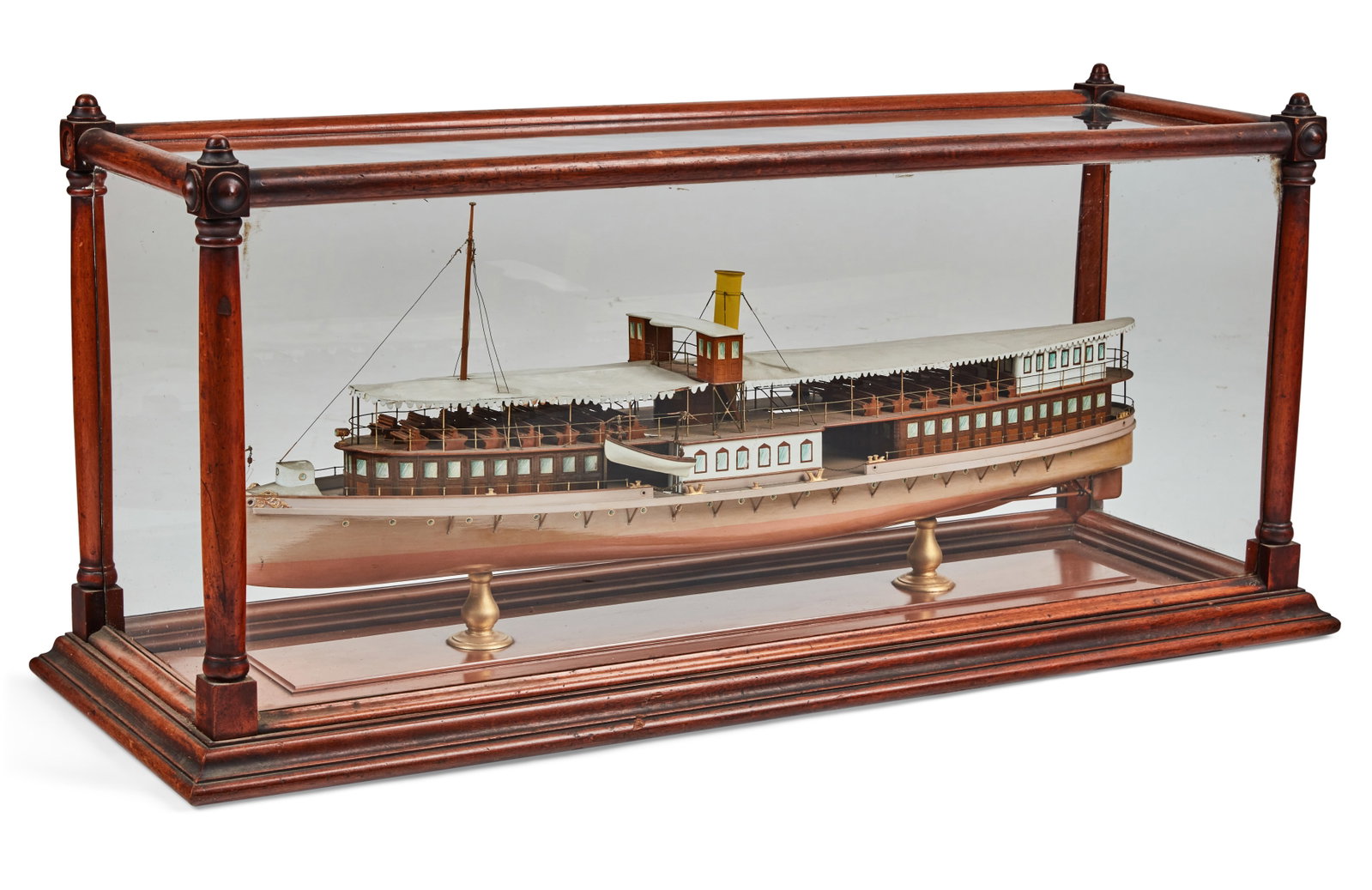A maritime model of a steamer: A maritime model of a steamer late 19th/early 20th century In a stained walnut and glass case.. overall height 21in (53.5cm); length 44in (112cm); depth 14 1/2in (37cm) Provenance: Property from th
