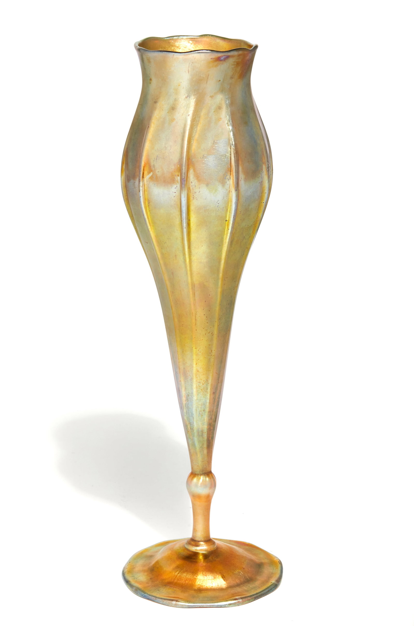 A Tiffany Studios yellow Favrile glass vase: A Tiffany Studios yellow Favrile glass vaseearly 20th centuryInscribed L.C. Tiffany Favrile 2319G.height 15in (38cm); diameter 4 3/4in (12cm) Provenance:The Edmund W. and Carol Browning Dumke