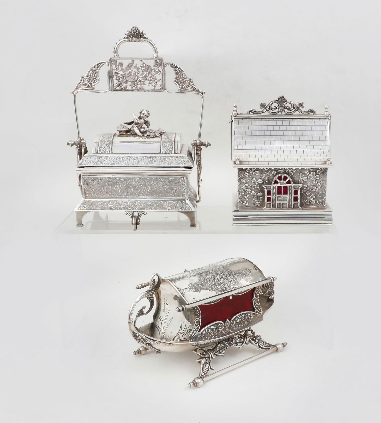Three Victorian silverplate table caskets: Three Victorian silverplate table casketslate 19th centuryAll with satin lined interiors.the largest height 8 3/4in (22cm); width 7in (18cm); depth 4 1/2in (11.5cm) Provenance:The Edmund W. and Carol
