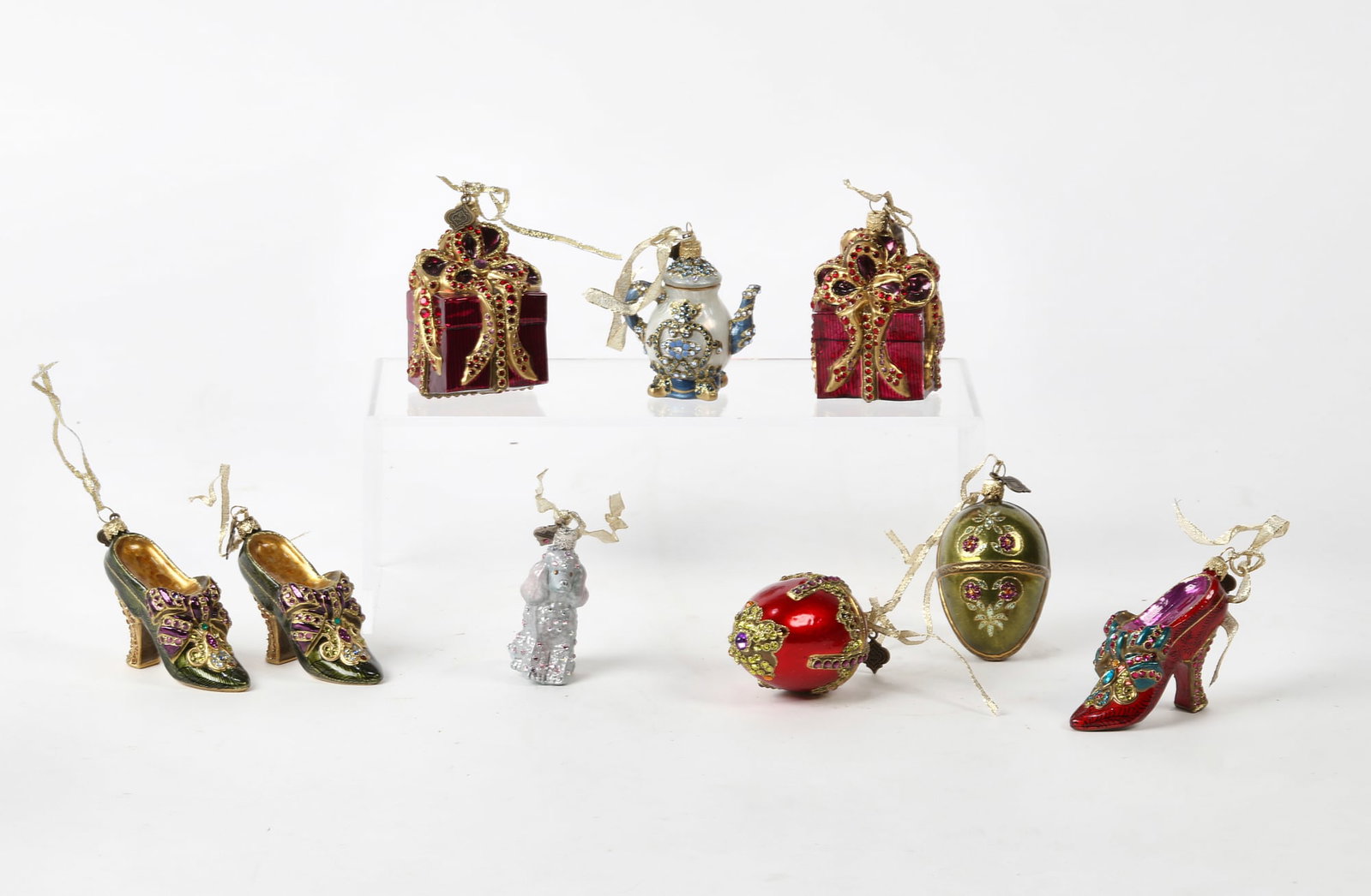 Nine Jay Strongwater metalware ornaments: A collection of nine Jay Strongwater enameled and 'jeweled' metalware ornaments modern largest height 3 1/2in (9cm); width 2 1/2in (6.5cm) square Provenance: The Edmund W. and Carol Browning Dumke Fam