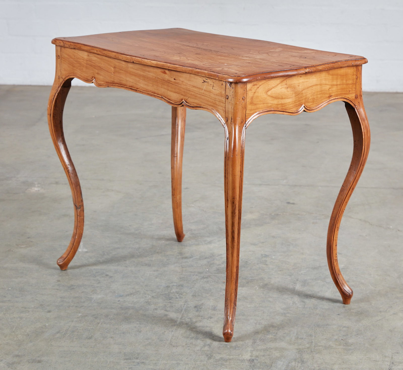 A Louis XV Provincial fruitwood side table (1 of 7)