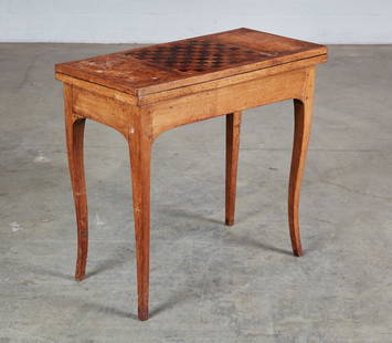 A Louis XV Provincial wood games table: A Louis XV Provincial walnut and mixed wood games table second half 18th century The rectangular hinged game board inlaid top opening to a green baize lined playing surface. closed height 28in