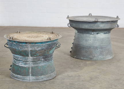 Two Southeast Asian metal rain drums: Two Southeast Asian metal rain drumslargest height 18 1/2in (47cm); diameter 24in (61cm) Provenance:Property from the Estate of Walter Nelson, ASID, San Diego, California.